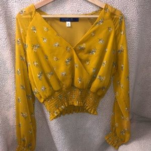Cropped yellow floral blouse